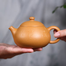Load image into Gallery viewer, Handmade Yixing Zisha Teapot, Traditional Yellow Clay Teapot with Hand Carved Character
